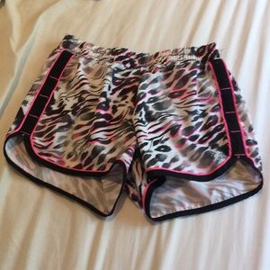 Pink Leopard print athletic shorts.
